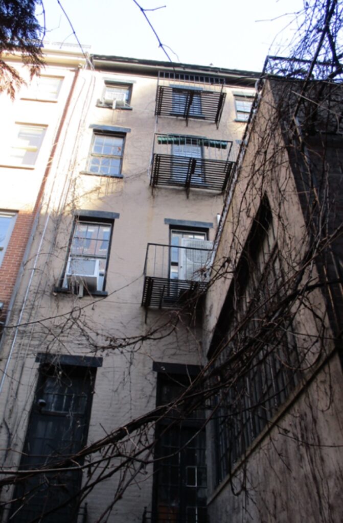 Photograph of previous conditions at 34 West 12th Street, via LPC proposal